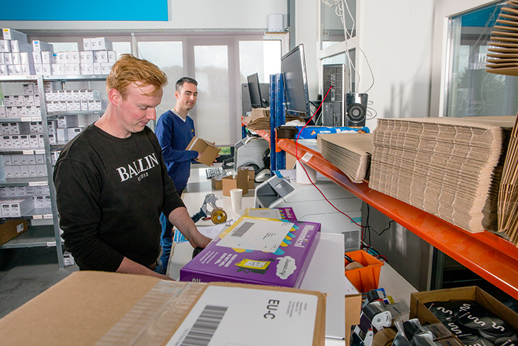 Packing tables in the Alleeninkt.nl warehouse