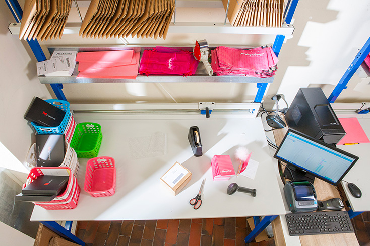 One of the packing tables at Boozyshop